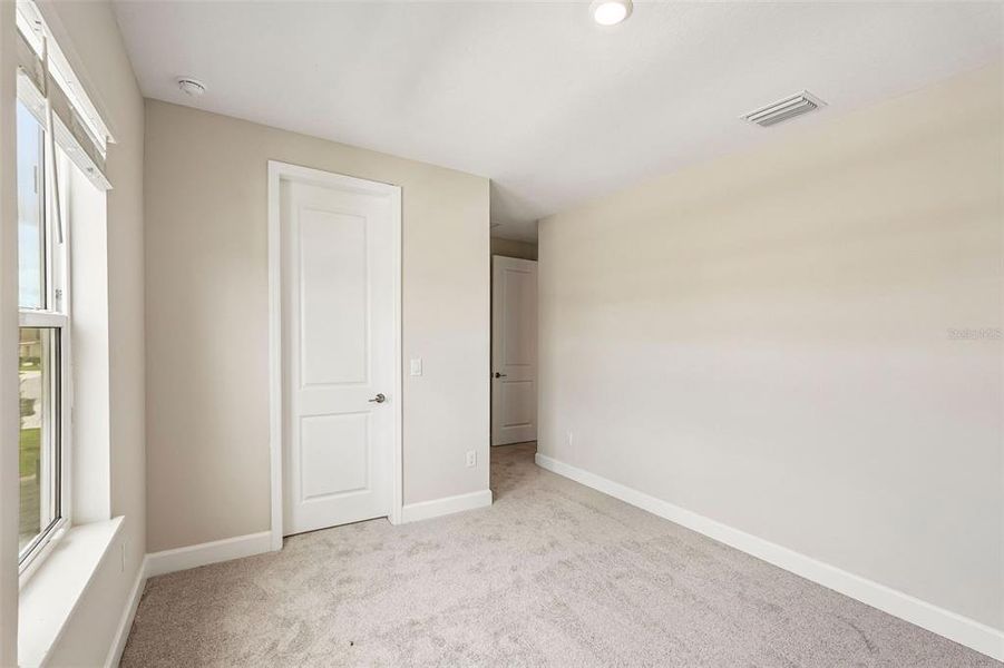 Spacious, unfurnished interior of a new home in Tiburon, Nokomis (Image 38).