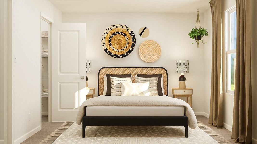 A bedroom with a bed and a lamp.