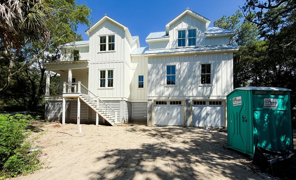 Front exterior of a new home in , Isle Of Palms, SC, highlighting curb appeal (Image 2). Front exterior of a new home in , Isle Of Palms, SC, highlighting curb appeal (Image 2).