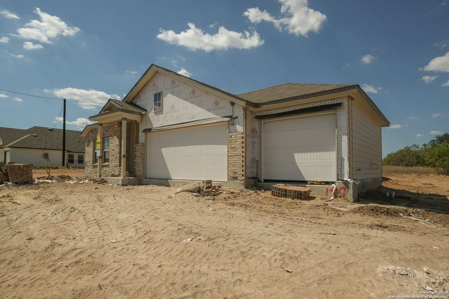 Exterior details and patio area of a home in Chaparral Ranch, Floresville (Image 2). Exterior details and patio area of a home in Chaparral Ranch, Floresville (Image 2).