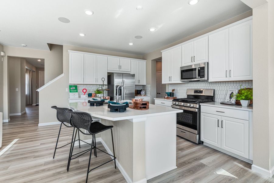 Representative furnished interior of a home built from the Granby by Taylor Morrison in Trailstone, Arvada (Image 12).
