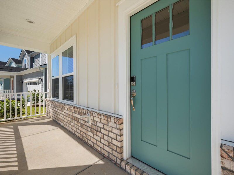 Exterior details and patio area of a home in The Coves at Lakes of Cane Bay, Summerville (Image 31). Exterior details and patio area of a home in The Coves at Lakes of Cane Bay, Summerville (Image 31).