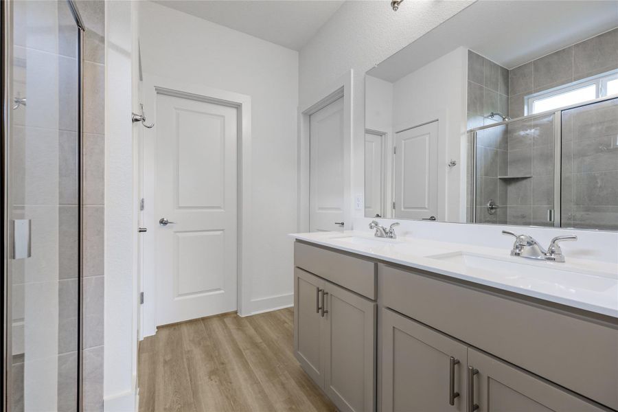 Floor to ceiling tile in shower.