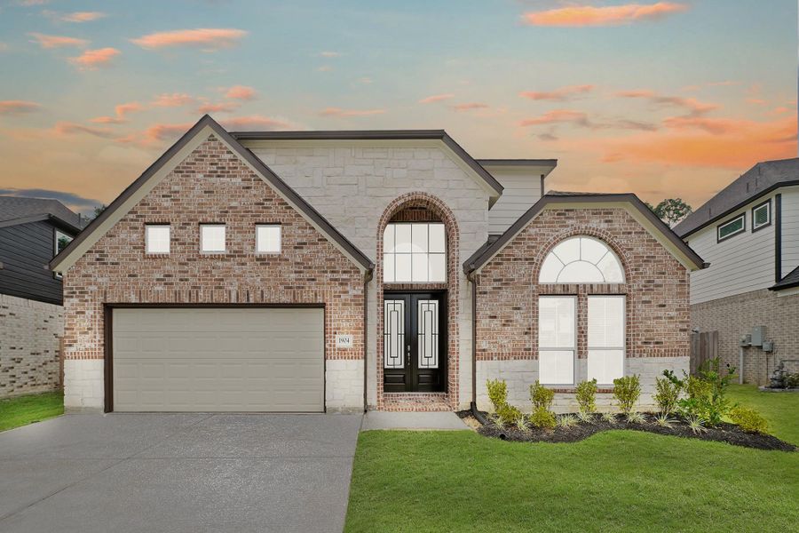 Front exterior of a new home in Barton Creek Ranch, Conroe, TX, highlighting curb appeal (Image 12). Front exterior of a new home in Barton Creek Ranch, Conroe, TX, highlighting curb appeal (Image 12).