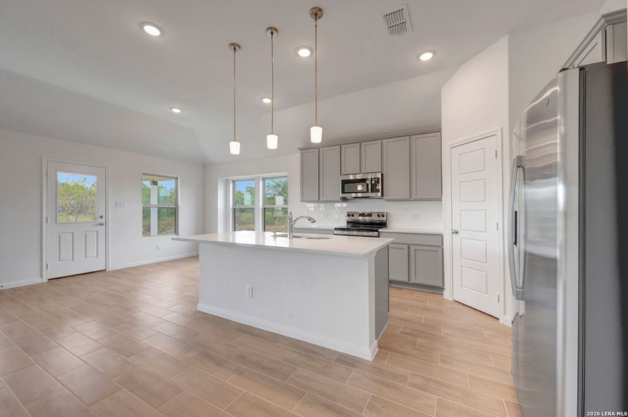 Furnished interior view inside a new home in Chaparral Ranch, Floresville (Image 6).