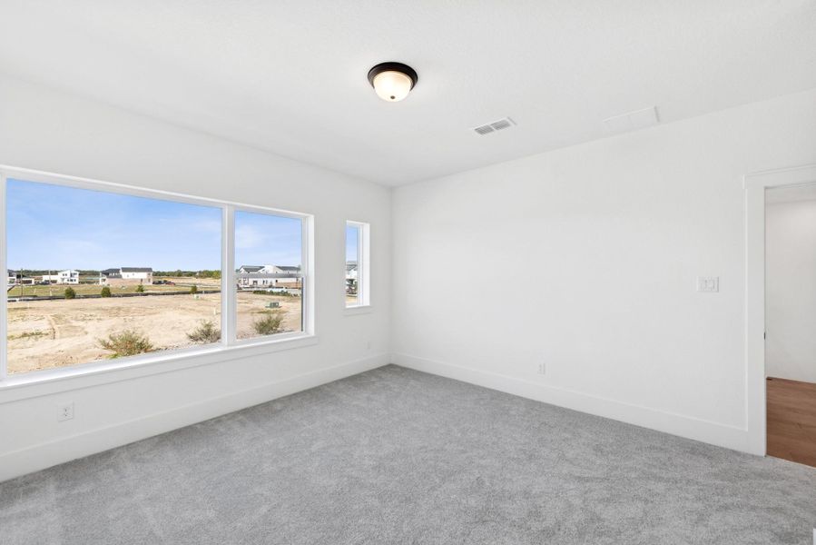 Spacious, unfurnished interior of a new home in Easthaven at Bridgeland Central - Horizon Collection, Cypress (Image 16).