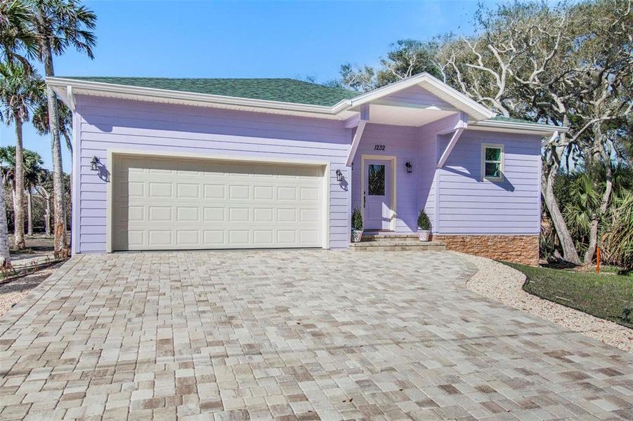 Front exterior of a new home in , Flagler Beach, FL, highlighting curb appeal (Image 29).