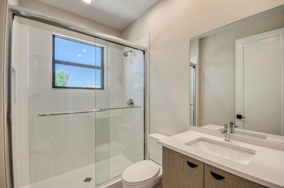 Furnished interior view inside a new home in Apex at Avenir, Palm Beach Gardens (Image 45).