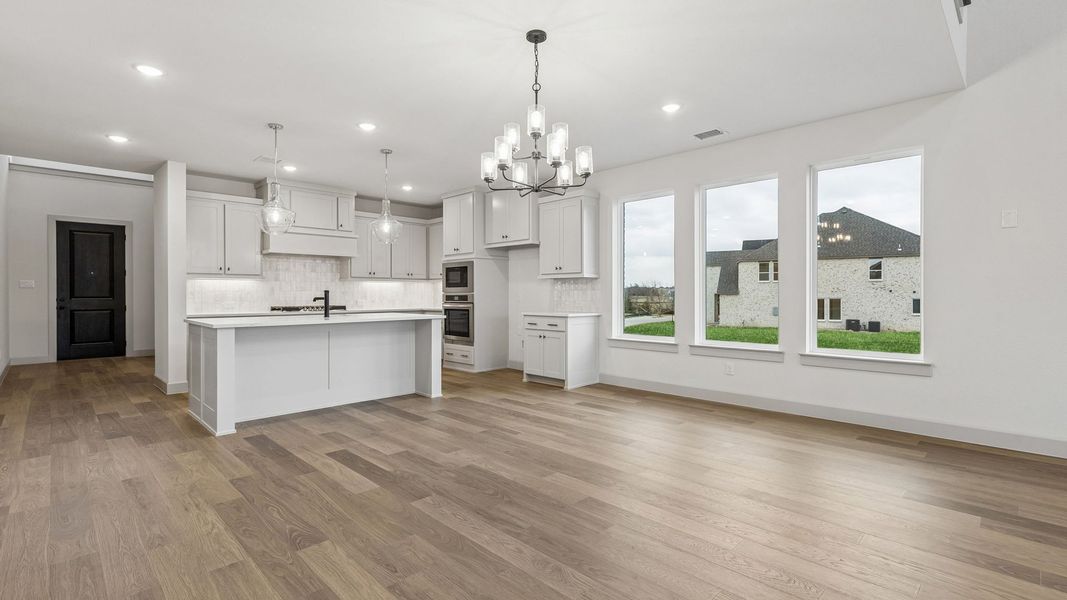 Representative furnished interior of a home built from the Toulouse II by Normandy Homes in Rainwater Crossing, Celina (Image 9).
