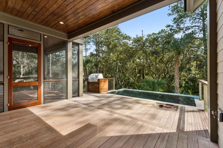 Exterior details and patio area of a home in , Johns Island (Image 18).