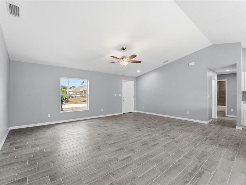 Spacious, unfurnished interior of a new home in , Port Charlotte (Image 19).