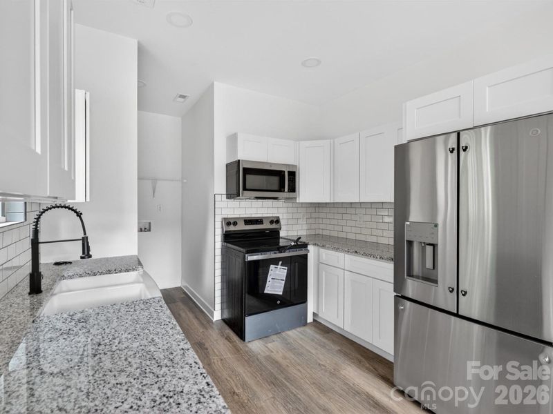 Furnished interior view inside a new home in , Hickory (Image 8).