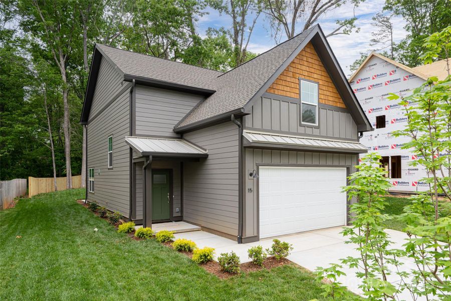 Front exterior of a new home in , Arden, NC, highlighting curb appeal (Image 1). Front exterior of a new home in , Arden, NC, highlighting curb appeal (Image 1).