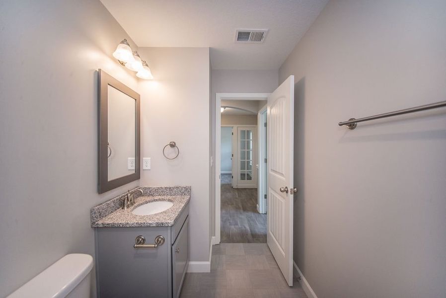 Representative furnished interior of a home built from the Beaumont by Enchanted Homes in Guadalupe Heights, Seguin (Image 10).