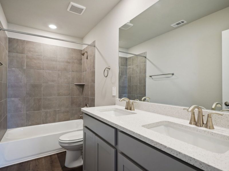 Furnished interior view inside a new home in Turner's Crossing - Reserve Collection, Buda (Image 6).