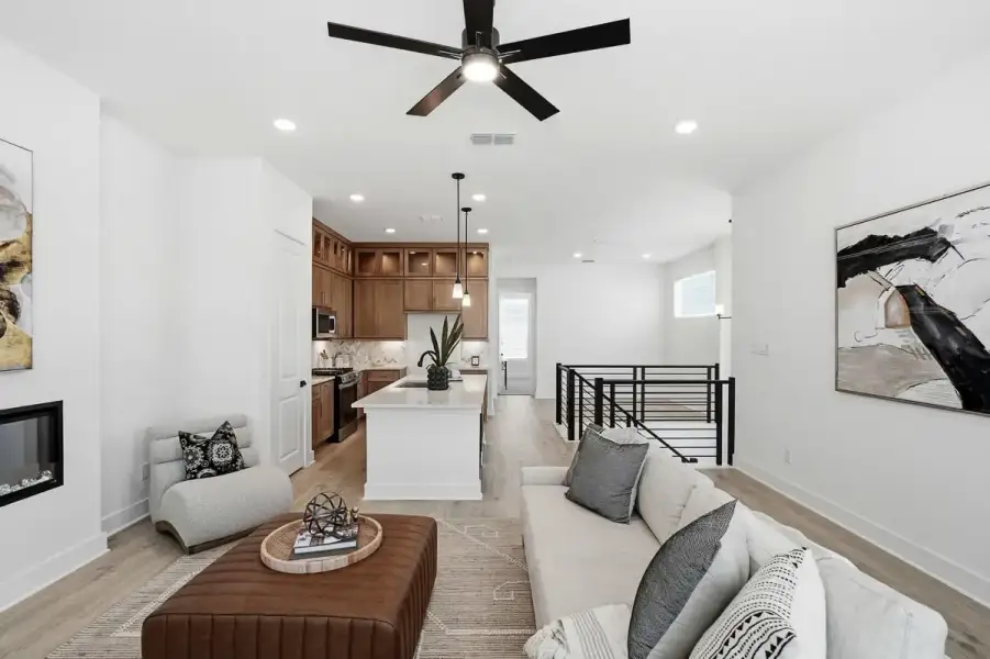 Representative furnished interior of a home built from the Calypso by Chesmar Homes in Centero at Stone Oak, San Antonio (Image 14).
