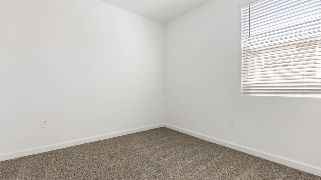 Spacious, unfurnished interior of a new home in Heartland Ranch, Coolidge (Image 22).