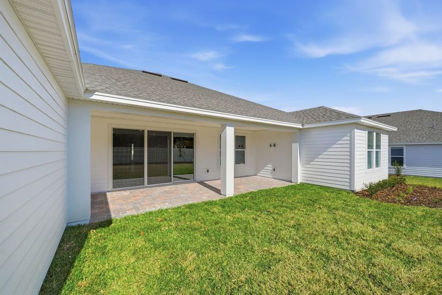 Exterior details and patio area of a home in Headwaters at Lofton Creek, Yulee (Image 3).