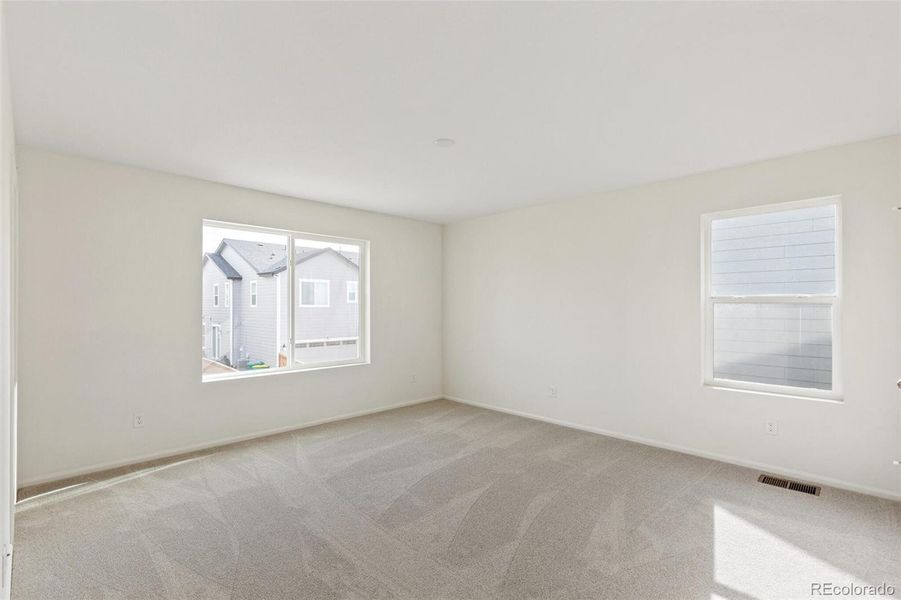 Spacious, unfurnished interior of a new home in Sky Ranch Villas, Watkins (Image 24).