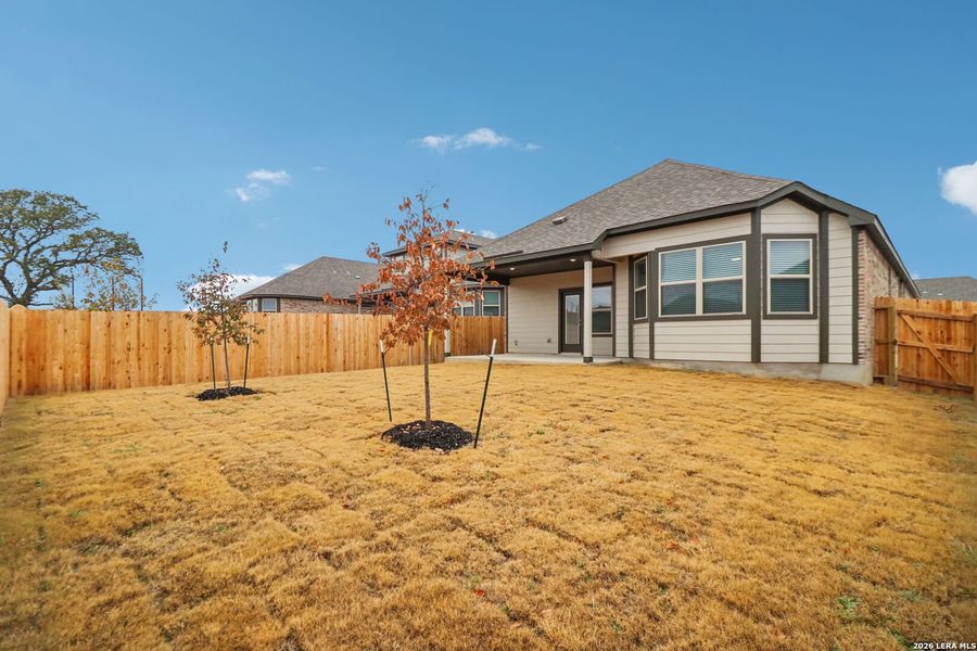 Exterior details and patio area of a home in Kallison Ranch, San Antonio (Image 24).