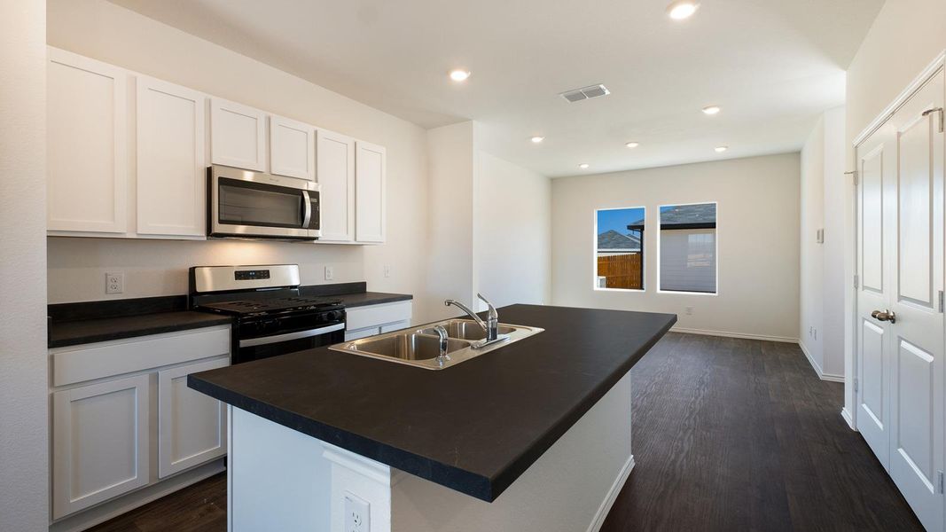 Furnished interior view inside a new home in Valverde, Bastrop (Image 9).