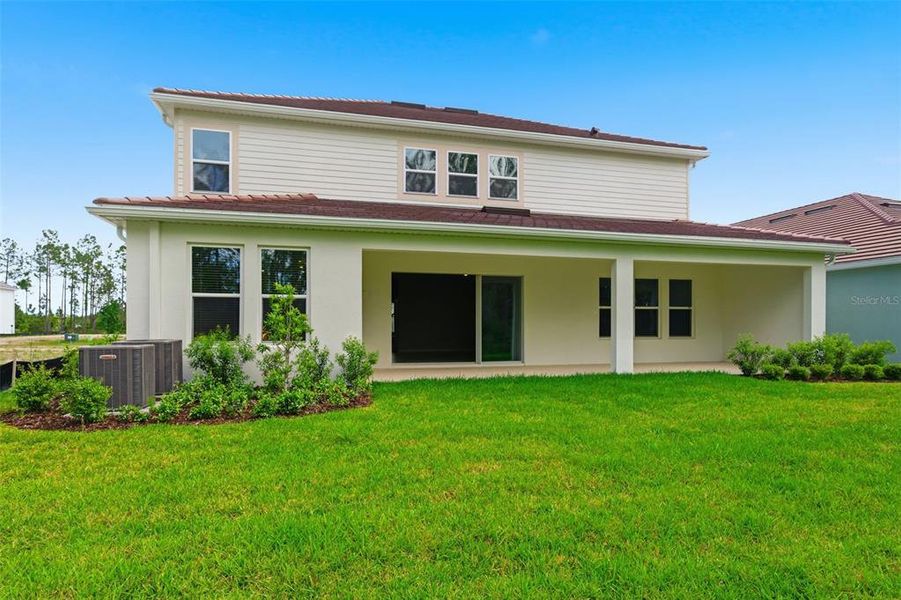 Exterior details and patio area of a home in Hammock at Two Rivers, Zephyrhills (Image 40).