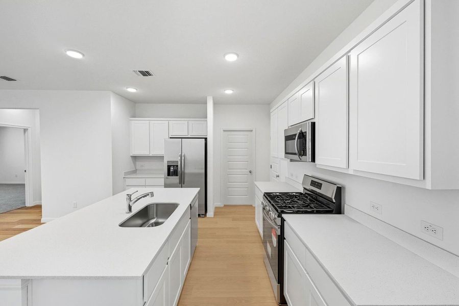 Furnished interior view inside a new home in Trinity Ranch, Elgin (Image 12). Furnished interior view inside a new home in Trinity Ranch, Elgin (Image 12).