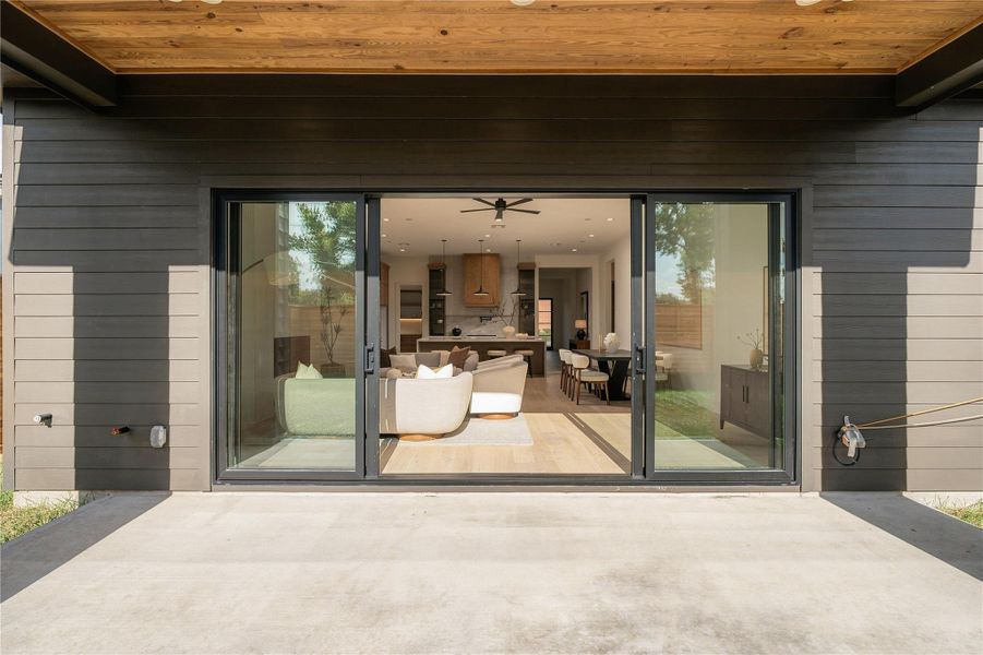 The covered patio extends the living experience outdoors, complete with a gas connection and pre-wiring for speakers for effortless entertaining year-round.