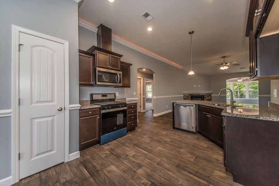 Representative furnished interior of a home built from the Jackson by Enchanted Homes in Lonesome Dove, San Antonio (Image 8).