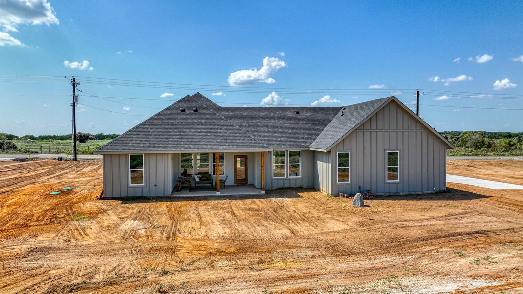 Representative exterior photo of a completed home built from the Loretta by Zeal Home Builders in Parallel Pastures, Poolville, TX (Image 27).