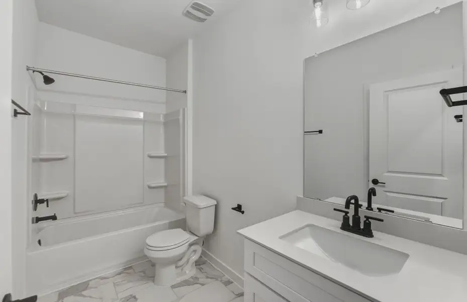 Furnished interior view inside a new home in Sunfield, Buda (Image 8).