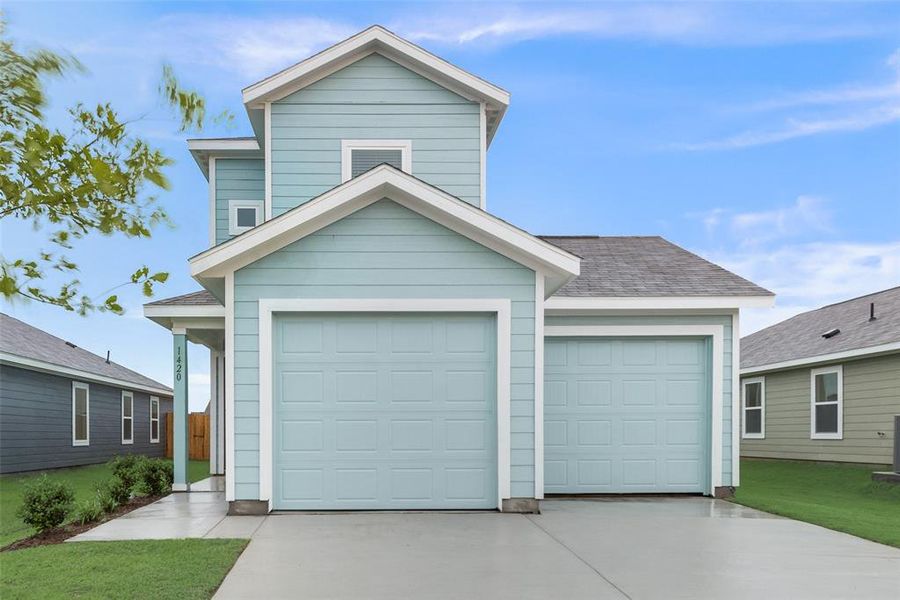 View of front of house featuring a garage