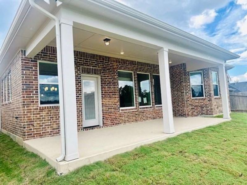 Large covered rear patio that benefits from the morning sunrise!