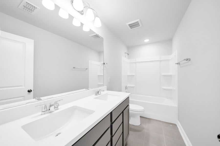 Furnished interior view inside a new home in Monroe Preserve, Chapin (Image 10).