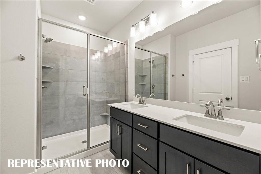 You'll never want to leave the oversized walk in shower in your new owner's bath!  REPRESENTATIVE PHOTO