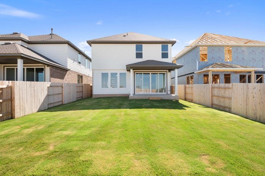 Front exterior of a new home in Terrace Collection at Lariat, Liberty Hill, TX, highlighting curb appeal (Image 20). Front exterior of a new home in Terrace Collection at Lariat, Liberty Hill, TX, highlighting curb appeal (Image 20).