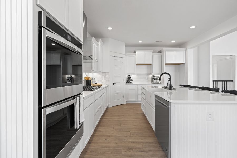Representative furnished interior of a home built from the Converse Elite by Enchanted Homes in Pointe Summit, Slater-Marietta (Image 17).
