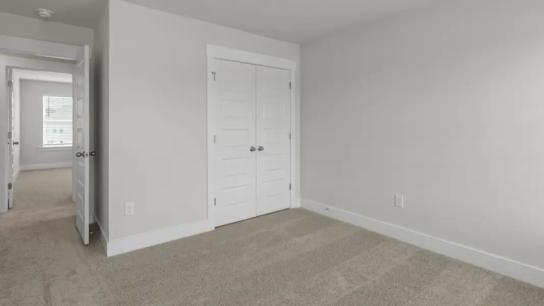 Spacious, unfurnished interior of a new home in The Highlands at Cedar Hill Landing, Navassa (Image 28).
