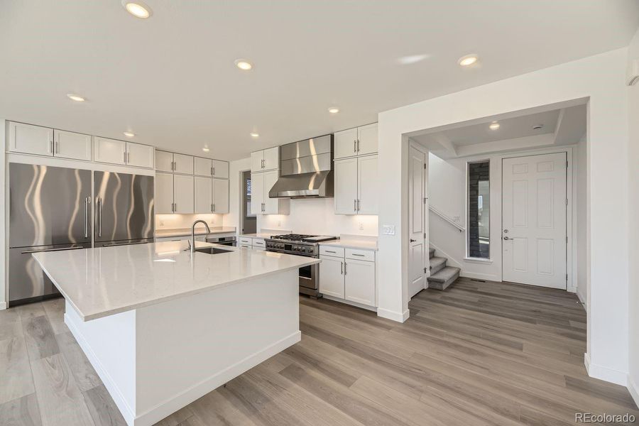Furnished interior view inside a new home in Red Rocks Ranch: The Grand Collection, Morrison (Image 3).
