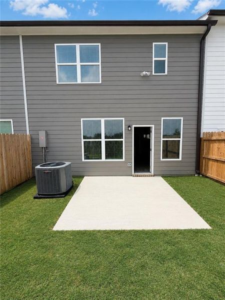 Exterior details and patio area of a home in Somerset at Riverbrook, Gainesville (Image 4).