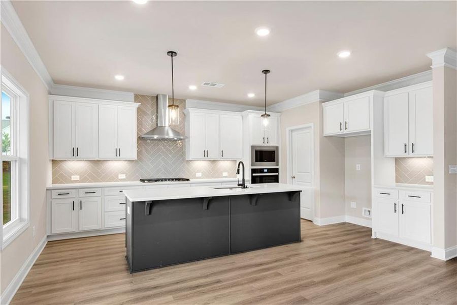 Furnished interior view inside a new home in Hidden Fields, Hoschton (Image 9).