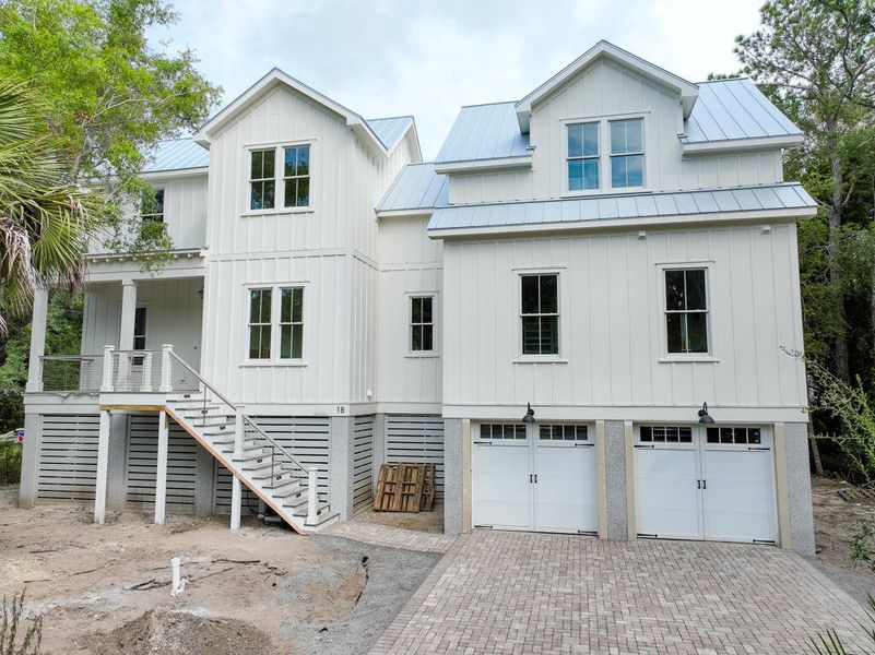 Front exterior of a new home in , Isle Of Palms, SC, highlighting curb appeal (Image 29). Front exterior of a new home in , Isle Of Palms, SC, highlighting curb appeal (Image 29).