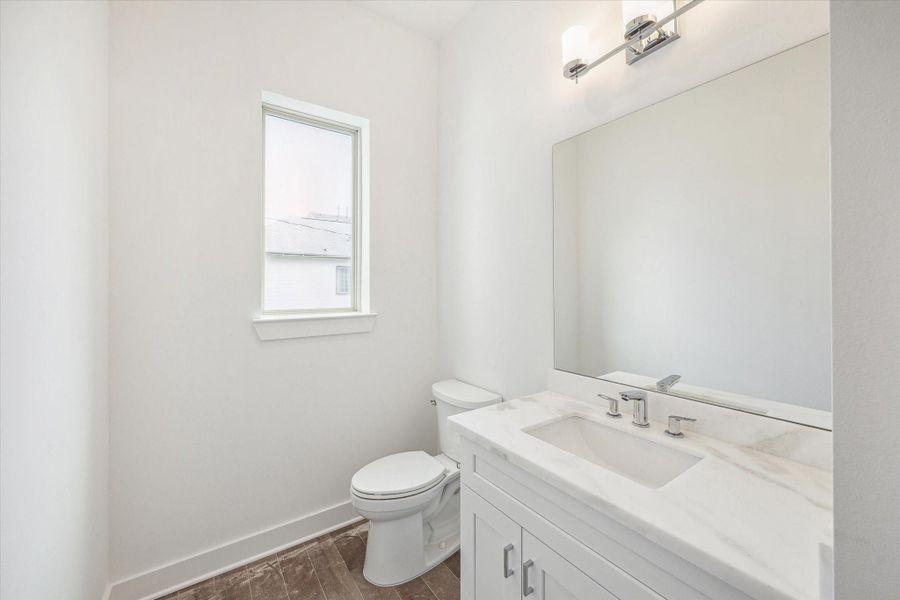 Powder Room on the Second Floor * Hardwood Floors * Marble Counter. Powder Room on the Second Floor * Hardwood Floors * Marble Counter.