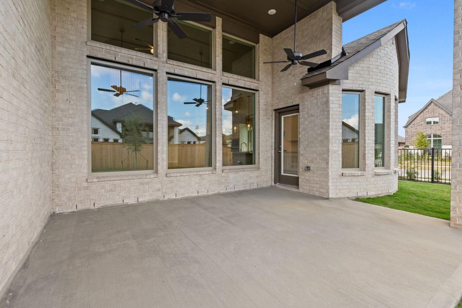Exterior details and patio area of a home in Bridgeland 55', Cypress (Image 21).