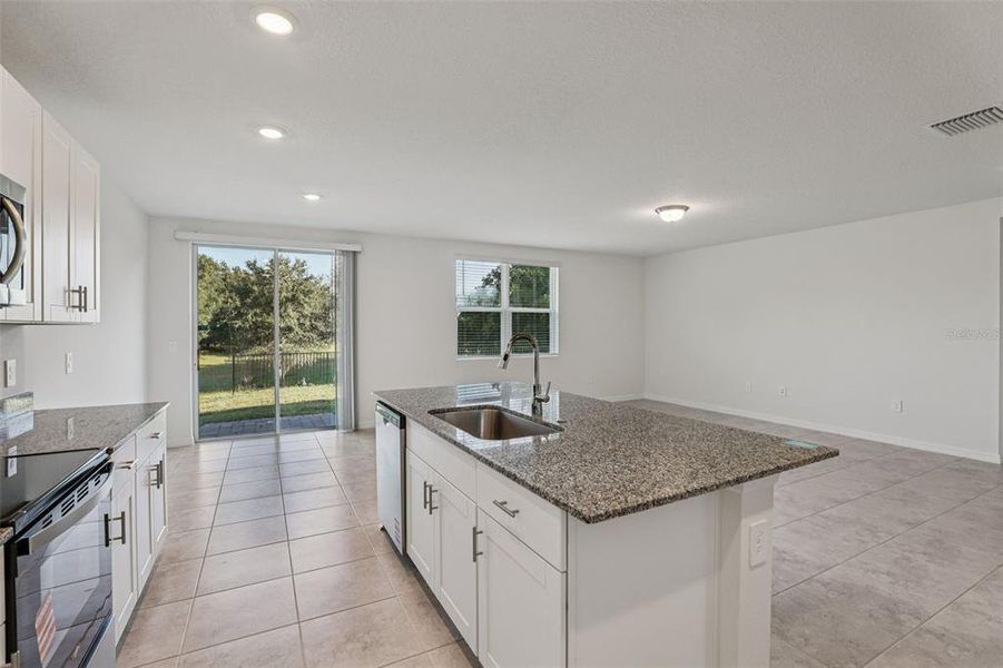 Furnished interior view inside a new home in Bradbury Creek - Signature Series, Haines City (Image 8).
