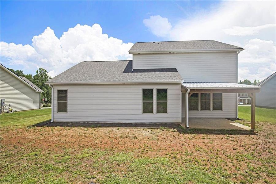 Exterior details and patio area of a home in Vineyard Park, Griffin (Image 22).