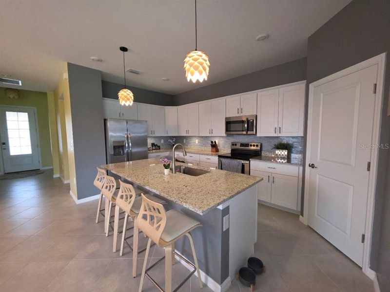 Furnished interior view inside a new home in , Port Charlotte (Image 25).