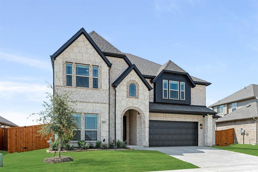 Front exterior of a new home in Timberbrook 3B-4A, Justin, TX, highlighting curb appeal (Image 25).