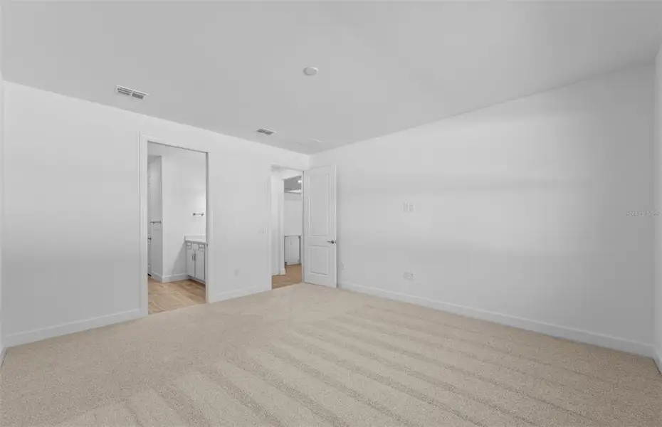 Spacious, unfurnished interior of a new home in Legacy Groves, Nokomis (Image 17).