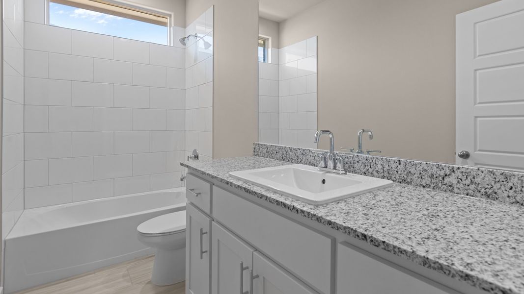 Representative furnished interior of a home built from the Cali by D.R. Horton in Legacy South, Midland (Image 8).